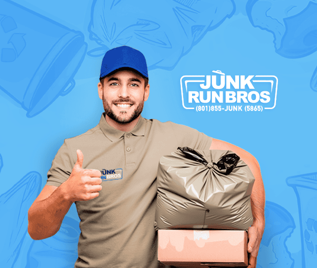 A friendly junk removal professional holding large trash bags, ready for property cleanout and hauling services.