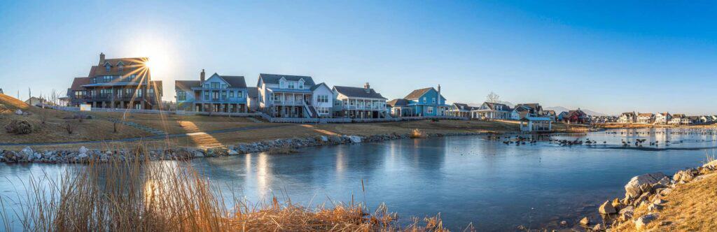 Scenic view of waterfront homes and calm water, perfect for property cleanouts and junk removal services.